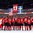 BUFFALO, NEW YORK - JANUARY 5: Team Canada players stand arm-in-arm for the national anthem following their 3-1 victory over Sweden during the gold medal game of the 2018 IIHF World Junior Championship. (Photo by Andrea Cardin/HHOF-IIHF Images)

